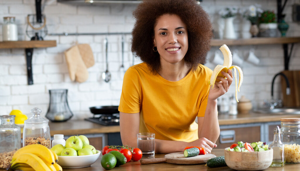 African American Woman Eating Healthy Foods for Annual Adult Checkup