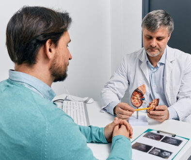 A Man Receiving Consultation From a Doctor On What Are the 3 Early Warning Signs of Kidney Disease